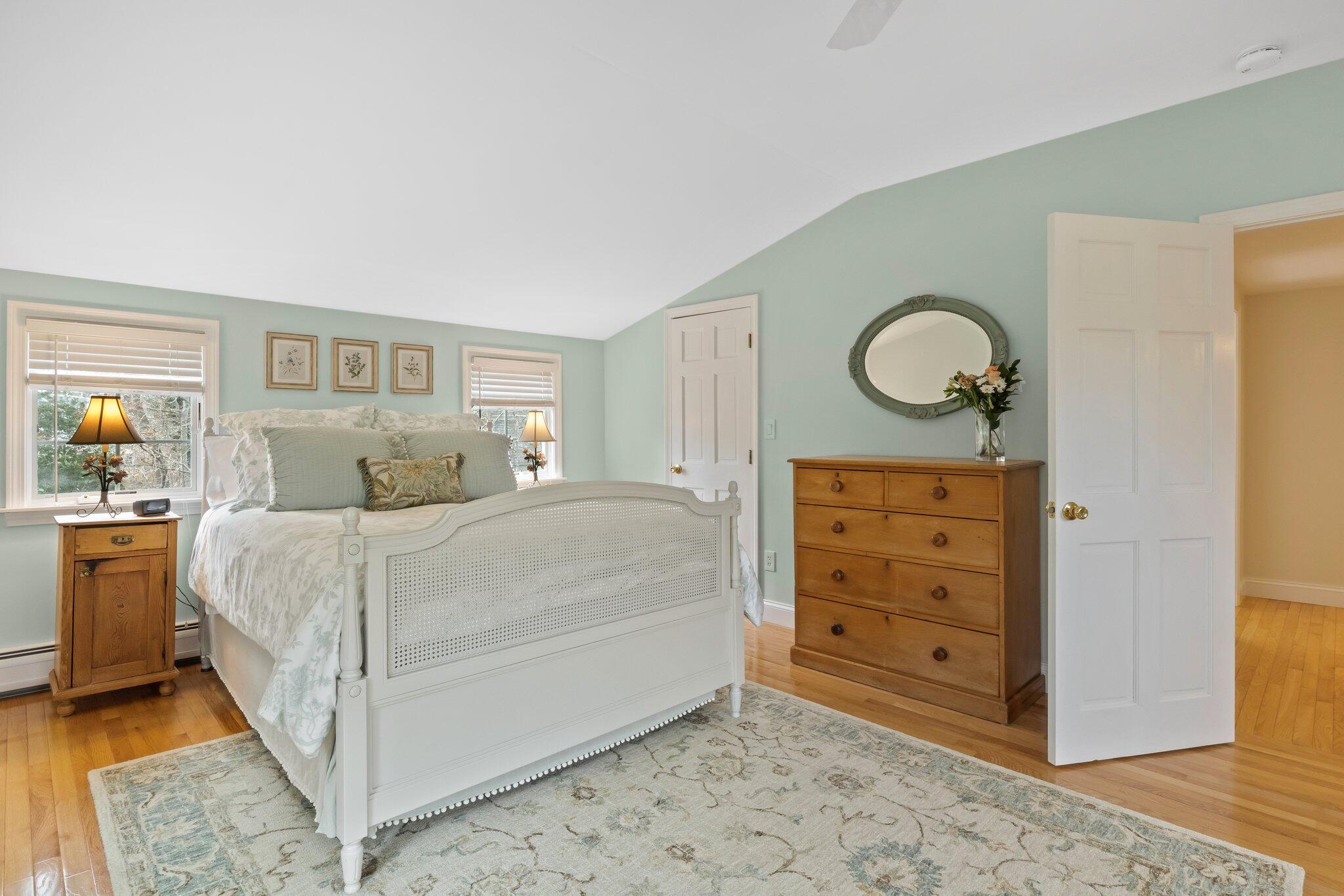 29 Jesse Eldredge Road Harwich, MA 02645 - Photo 38 of 56 a bedroom with a bed and a cabinets