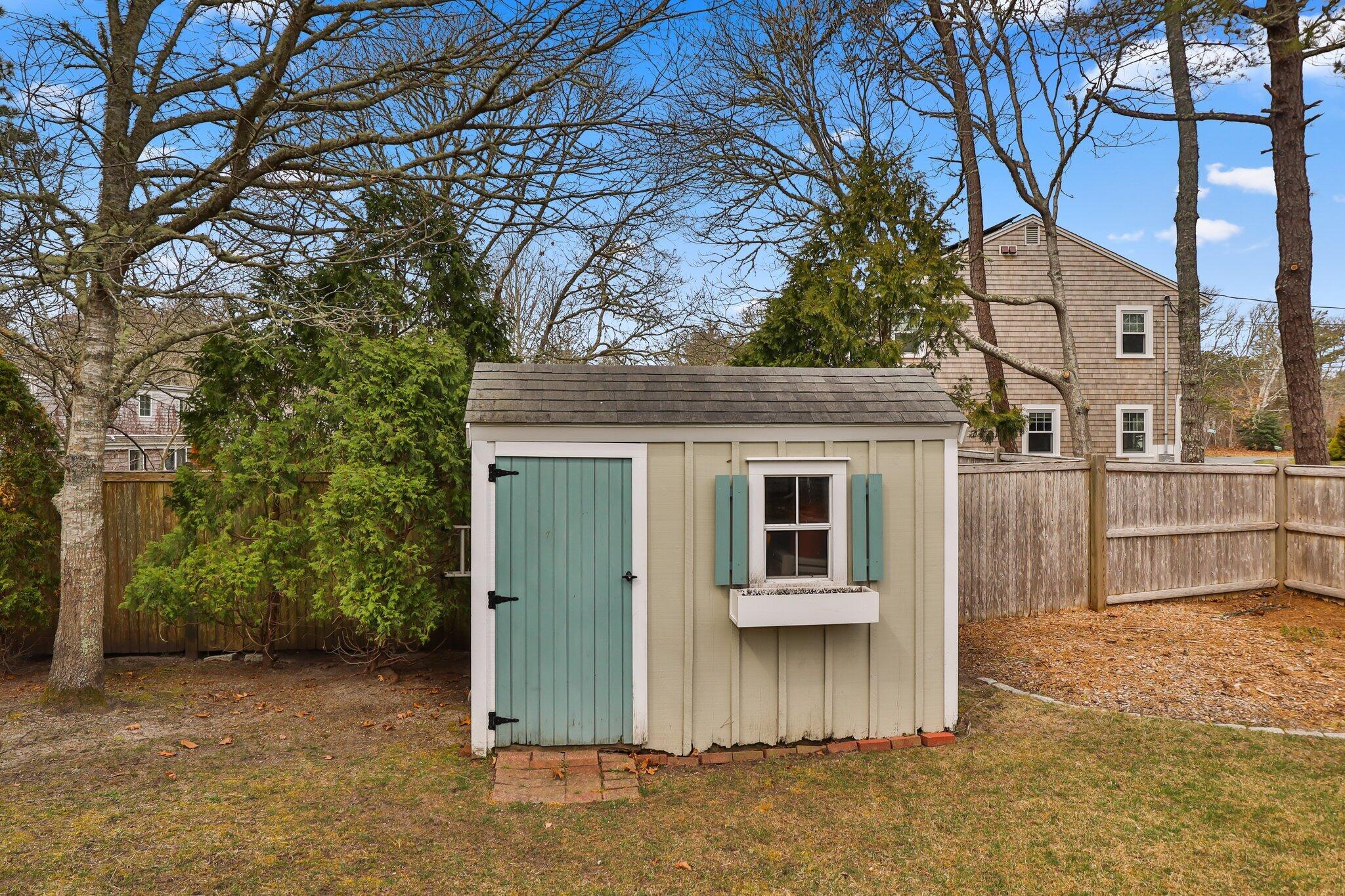 29 Jesse Eldredge Road Harwich, MA 02645 - Photo 50 of 56 a view of a house with a yard