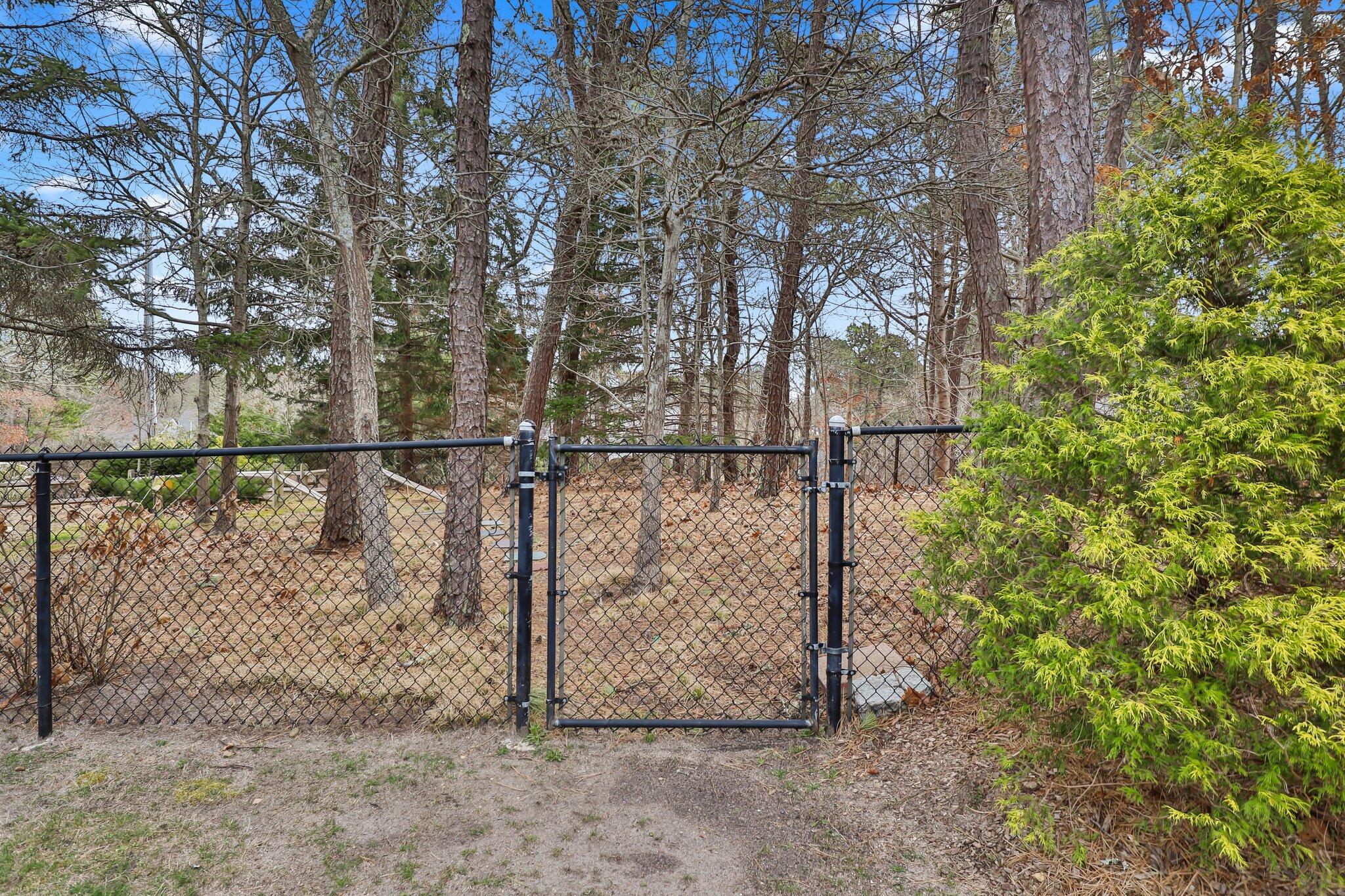 29 Jesse Eldredge Road Harwich, MA 02645 - Photo 53 of 56 a view of outdoor space and tennis court