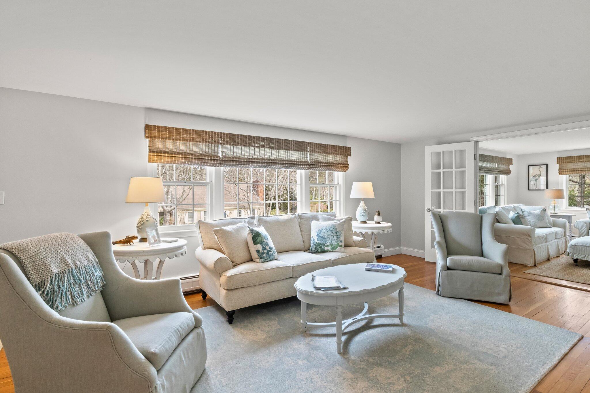 29 Jesse Eldredge Road Harwich, MA 02645 - Photo 7 of 56 a living room with furniture and a large window