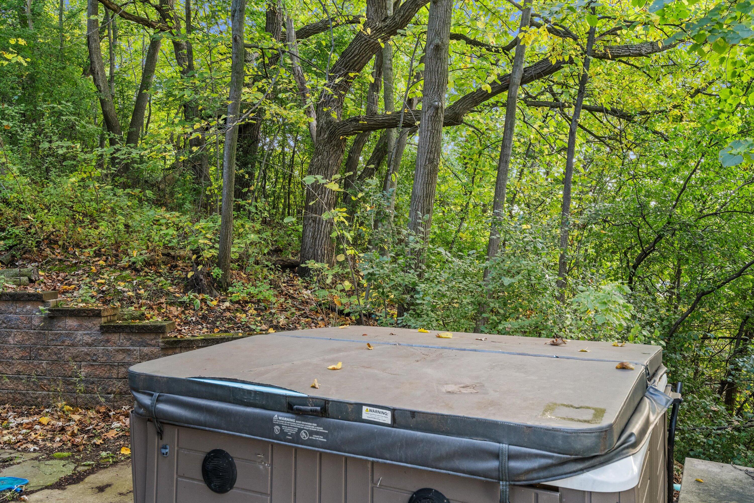 N9254 East Shore Road East Troy, WI 53120 - Photo 37 of 42 37-Hot Tub with a peaceful Setting