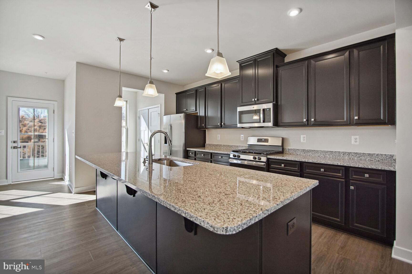 14941 Ring House Road, Unit E Brandywine, MD 20613 - Photo 8 of 24 KITCHEN WI/GRANITE COUNTERTOPS