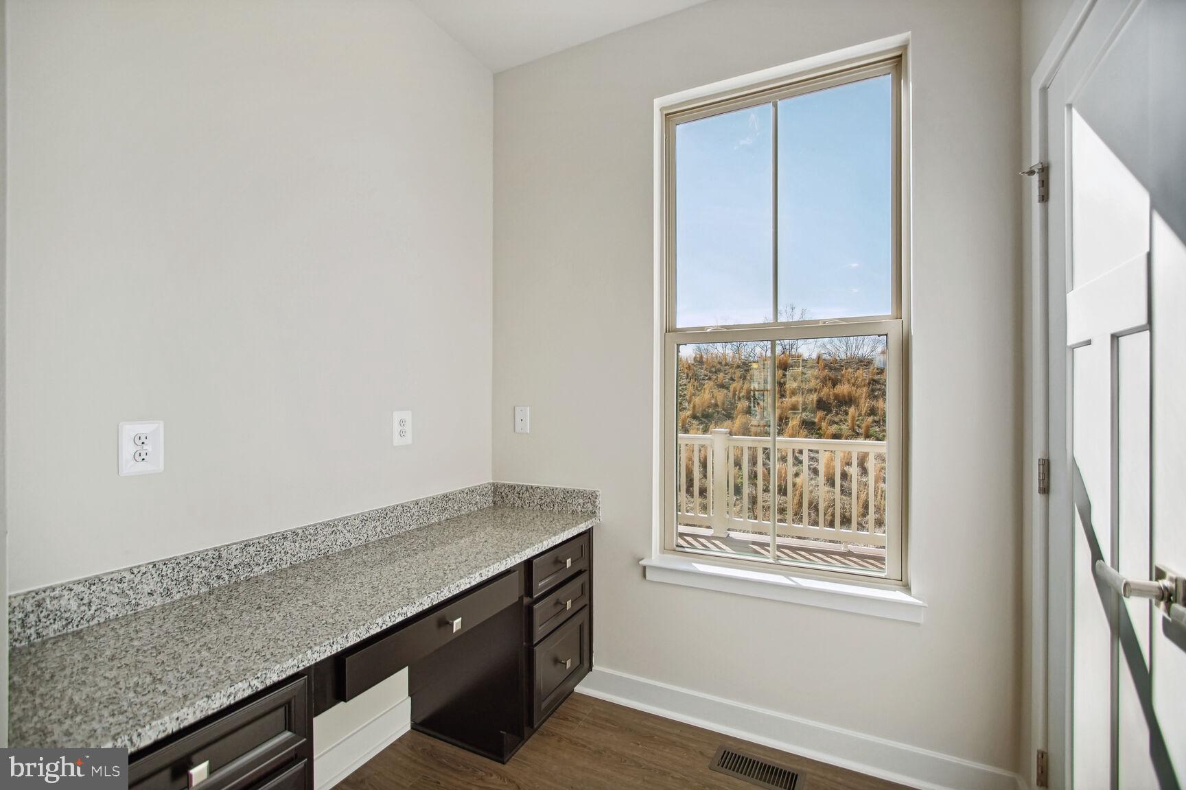 14941 Ring House Road, Unit E Brandywine, MD 20613 - Photo 9 of 24 POCKET OFFICE W/DESK OFF OF KITCHEN