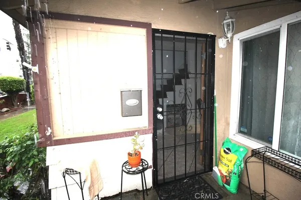 a view of an entryway with outdoor seating