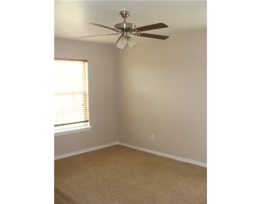 a view of a room with a window