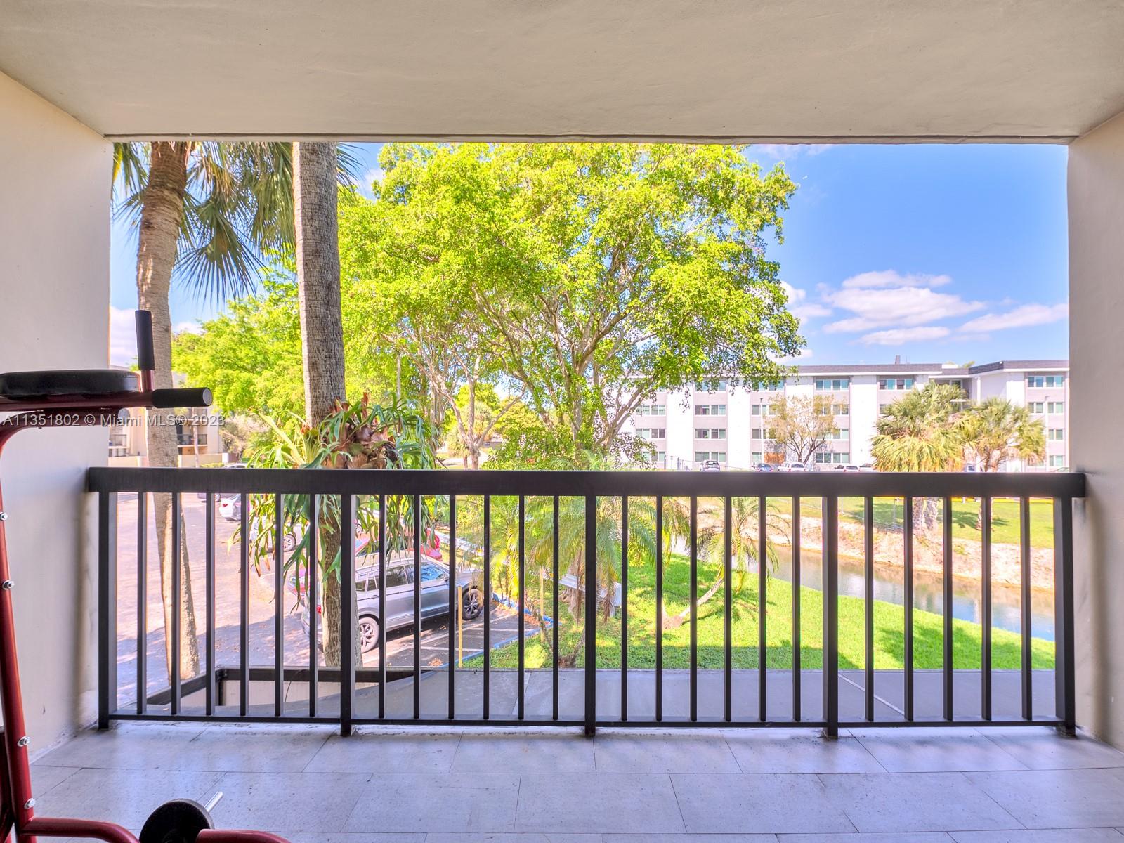 10865 Southwest 112th Avenue, Unit 209 Miami, FL 33176 - Photo 13 of 29 a view of city from the balcony