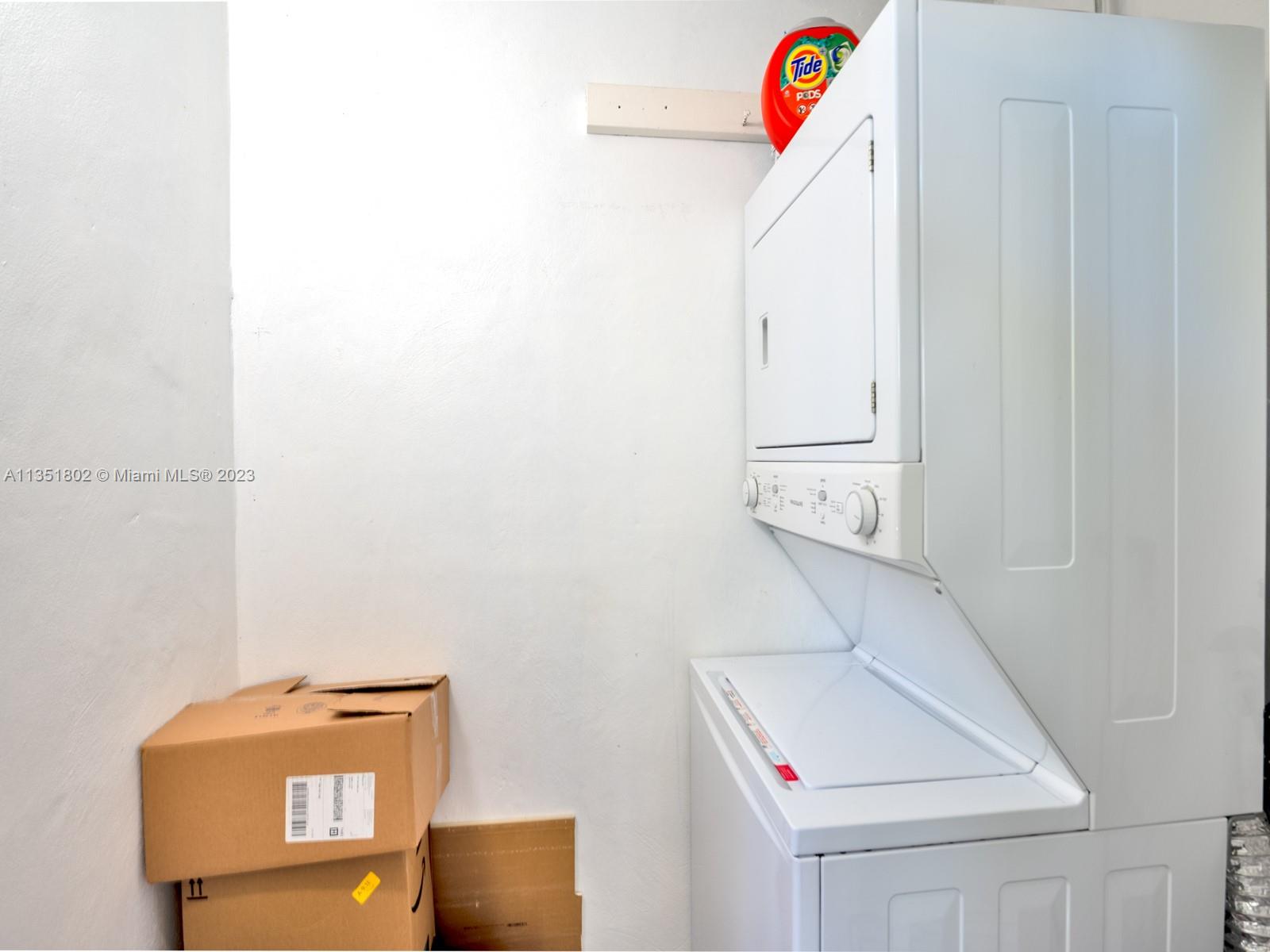 10865 Southwest 112th Avenue, Unit 209 Miami, FL 33176 - Photo 20 of 29 a utility room with dryer and washer