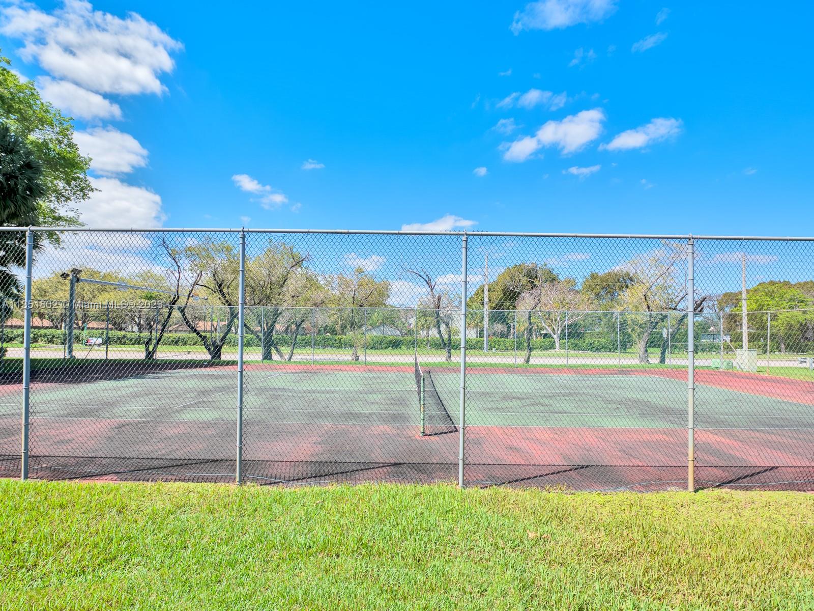 10865 Southwest 112th Avenue, Unit 209 Miami, FL 33176 - Photo 28 of 29 a view of outdoor space and yard