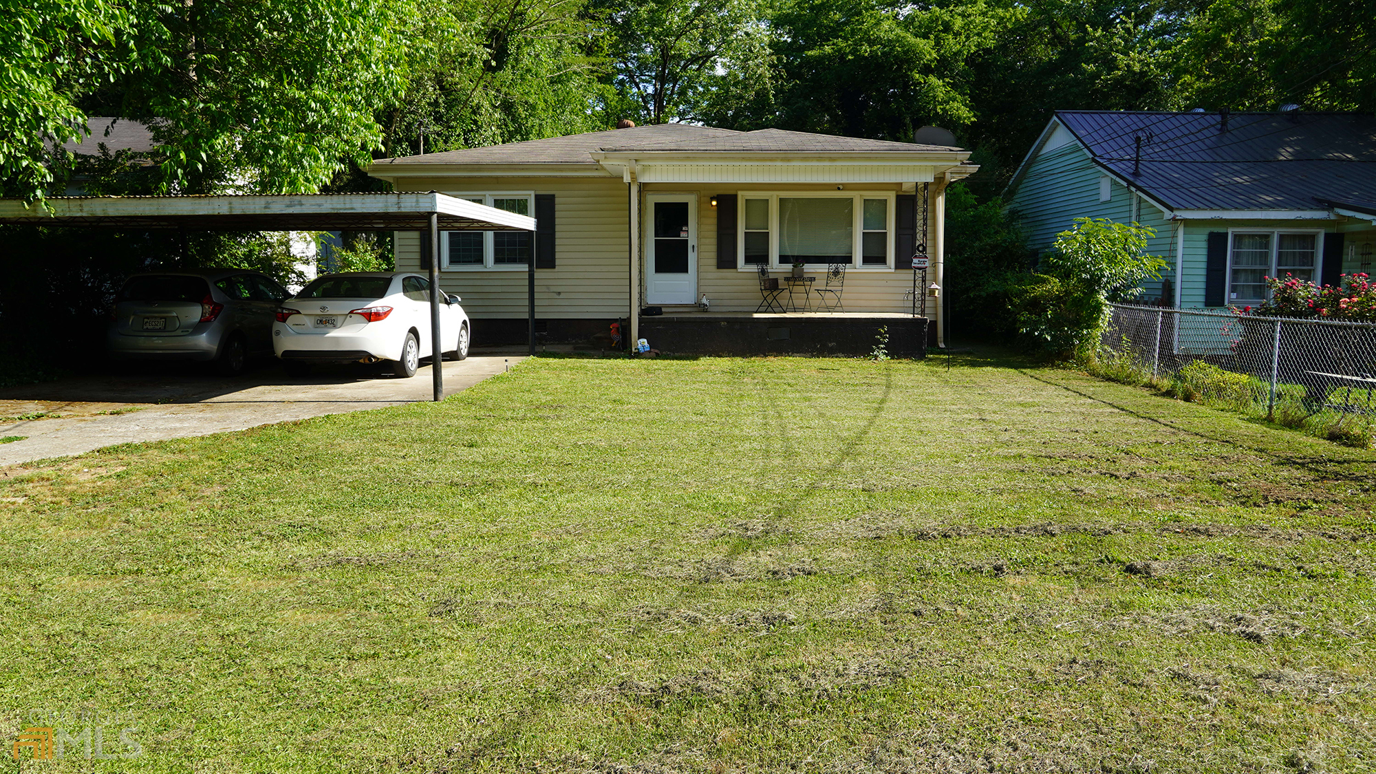 106 Holly Street Southeast Rome, GA 30161 - Photo 1 of 1 a front view of a house with a yard