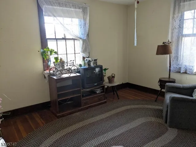 a room with furniture and a window
