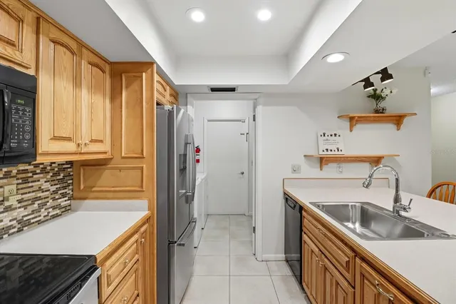 a bathroom with a sink and a shower
