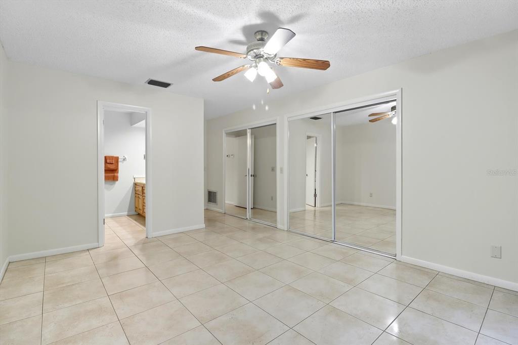 25 Jamaica Street Homosassa, FL 34446 - Photo 25 of 49 wooden floor in an empty room