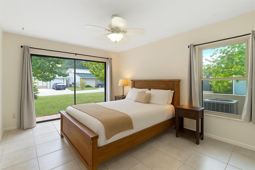 25 Jamaica Street Homosassa, FL 34446 - Photo 30 of 49 a bedroom with a bed and a large window