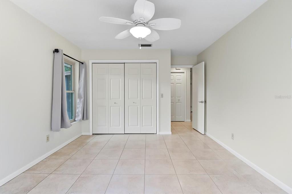 25 Jamaica Street Homosassa, FL 34446 - Photo 32 of 49 a view of an empty room with a fan