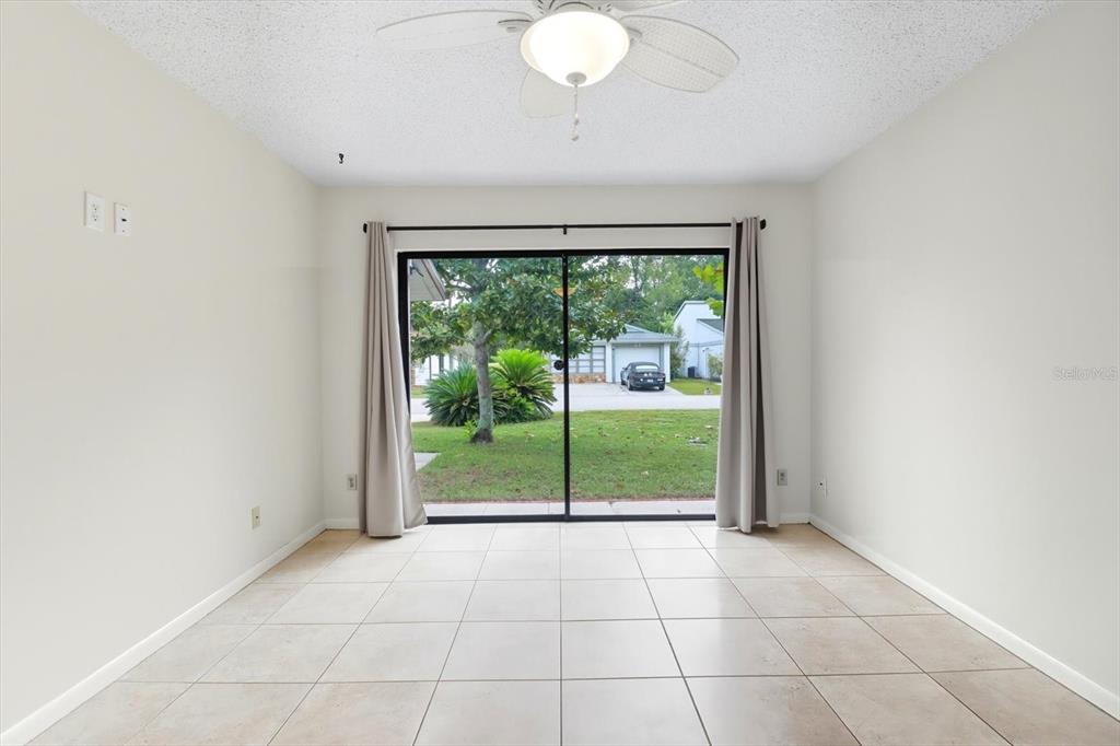 25 Jamaica Street Homosassa, FL 34446 - Photo 33 of 49 a view of an empty room with sliding glass door