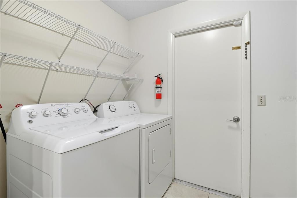 25 Jamaica Street Homosassa, FL 34446 - Photo 35 of 49 a utility room with dryer and washer
