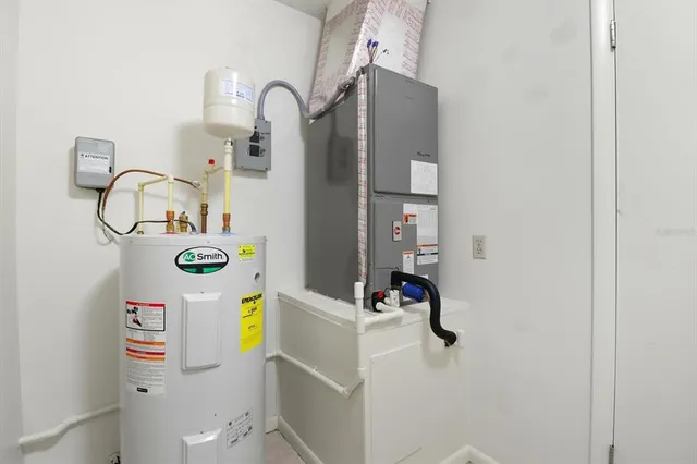 a bathroom with a sink toilet and mirror