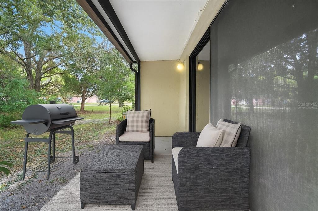 25 Jamaica Street Homosassa, FL 34446 - Photo 42 of 49 a living room with furniture and a large window