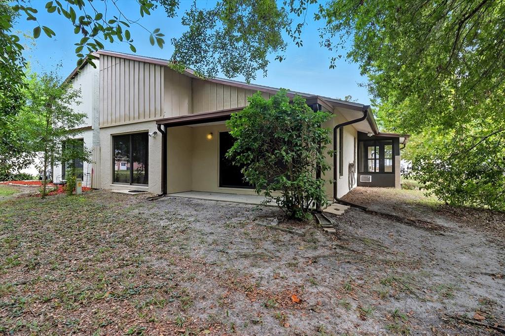 25 Jamaica Street Homosassa, FL 34446 - Photo 44 of 49 a view of a house with a yard and tree