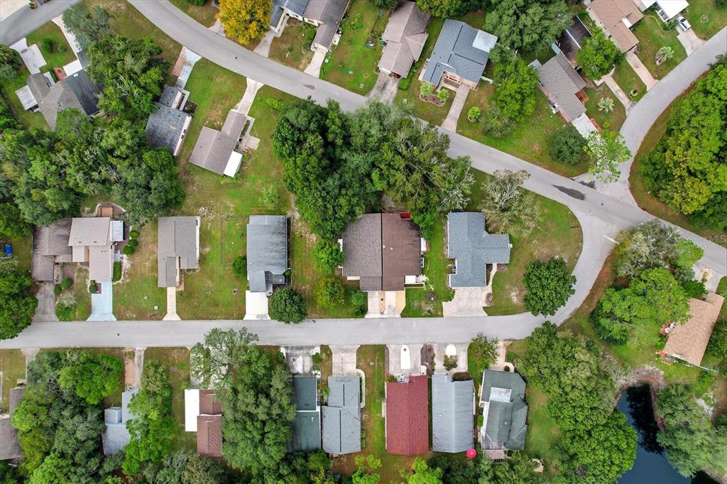 25 Jamaica Street Homosassa, FL 34446 - Photo 49 of 49 an aerial view of residential houses with outdoor space