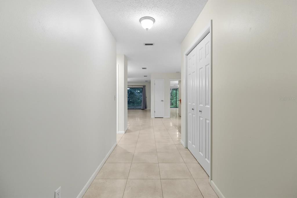 25 Jamaica Street Homosassa, FL 34446 - Photo 9 of 49 a view of a hallway with a bathroom