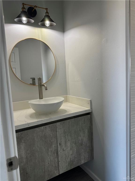 2801 Stablewood Mission, TX 78574 - Photo 12 of 18 a bathroom with a sink and a mirror