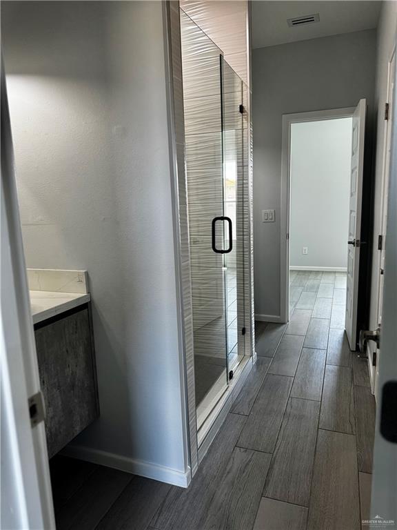 2801 Stablewood Mission, TX 78574 - Photo 13 of 18 a bathroom with a glass door shower