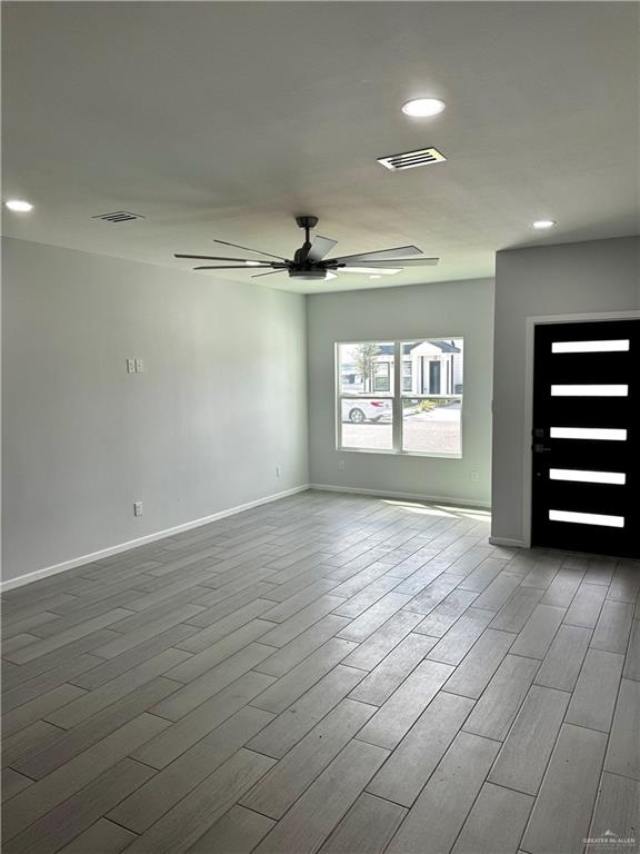 2801 Stablewood Mission, TX 78574 - Photo 4 of 18 an empty room with windows and closet