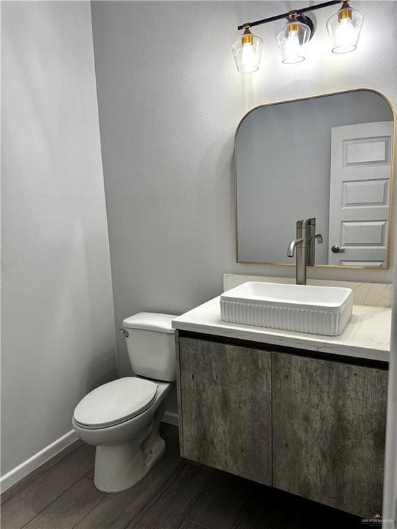 2801 Stablewood Mission, TX 78574 - Photo 6 of 18 a bathroom with a sink toilet and mirror