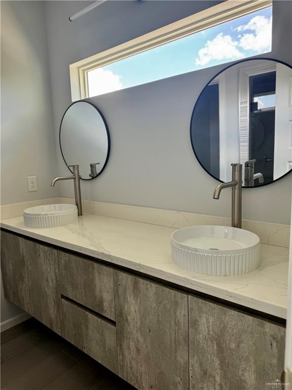 2801 Stablewood Mission, TX 78574 - Photo 8 of 18 a bathroom with a double vanity sink and a mirror