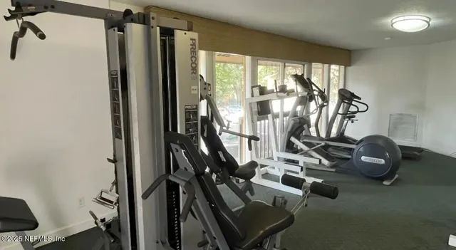 a view of a room with gym equipment