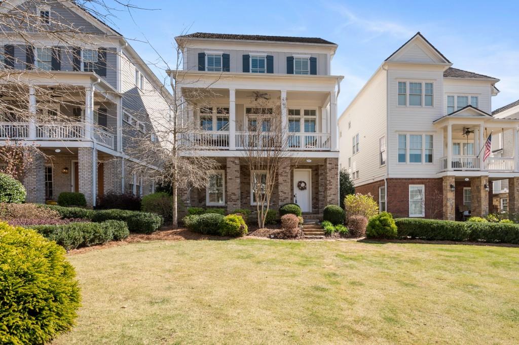 a front view of a building with many windows