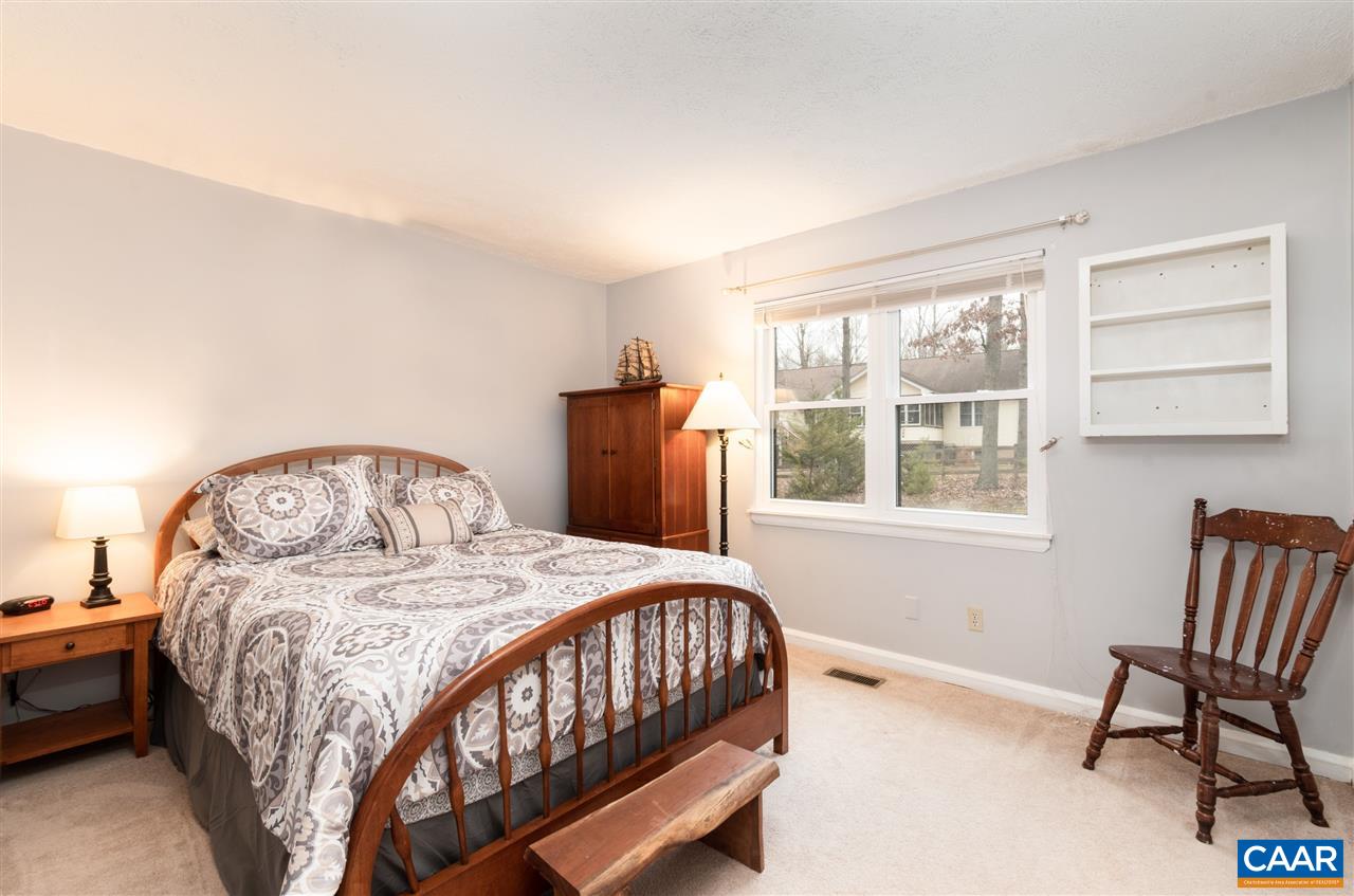 33 Oak Grove Road Palmyra, VA 22963 - Photo 17 of 42 a bedroom with a bed and a window