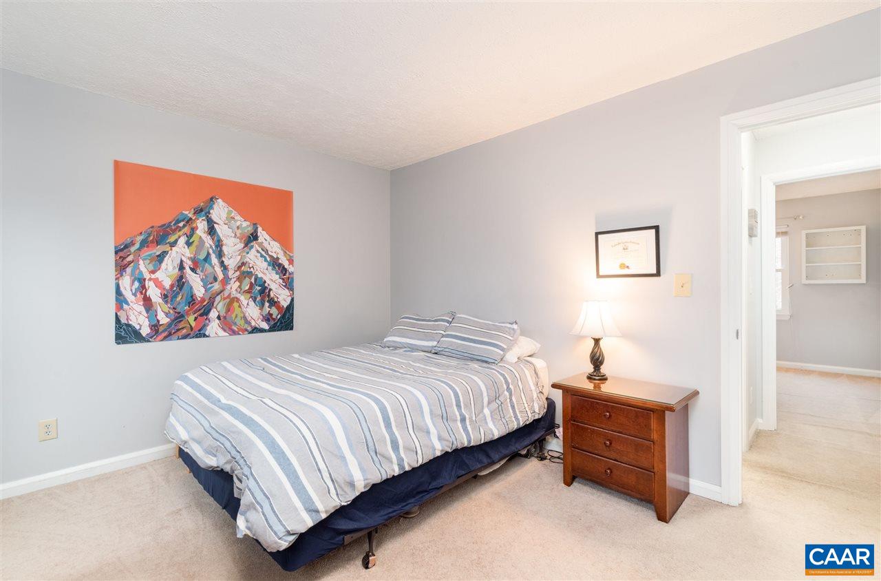 33 Oak Grove Road Palmyra, VA 22963 - Photo 22 of 42 a bedroom with a bed and painting on the wall