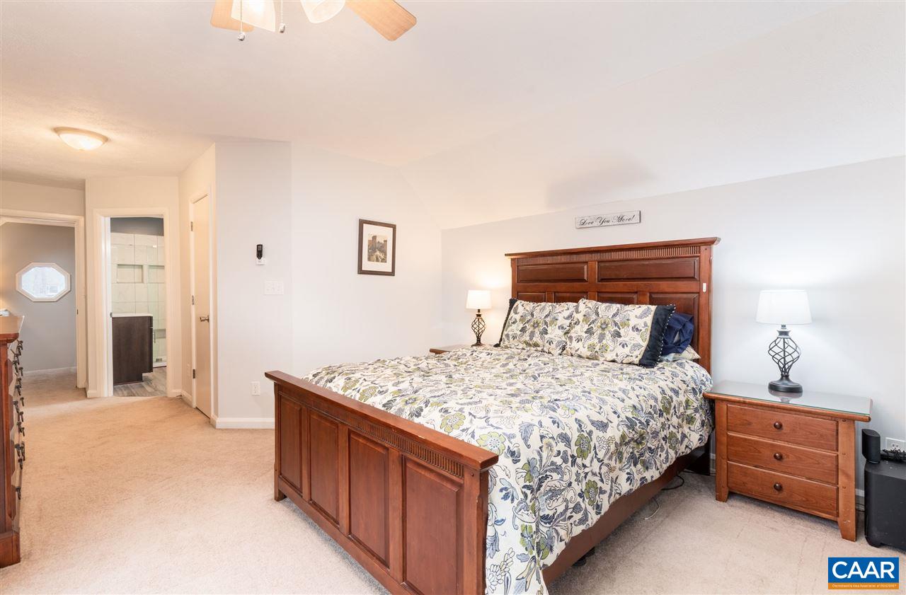 33 Oak Grove Road Palmyra, VA 22963 - Photo 30 of 42 a bedroom with a bed and a dresser