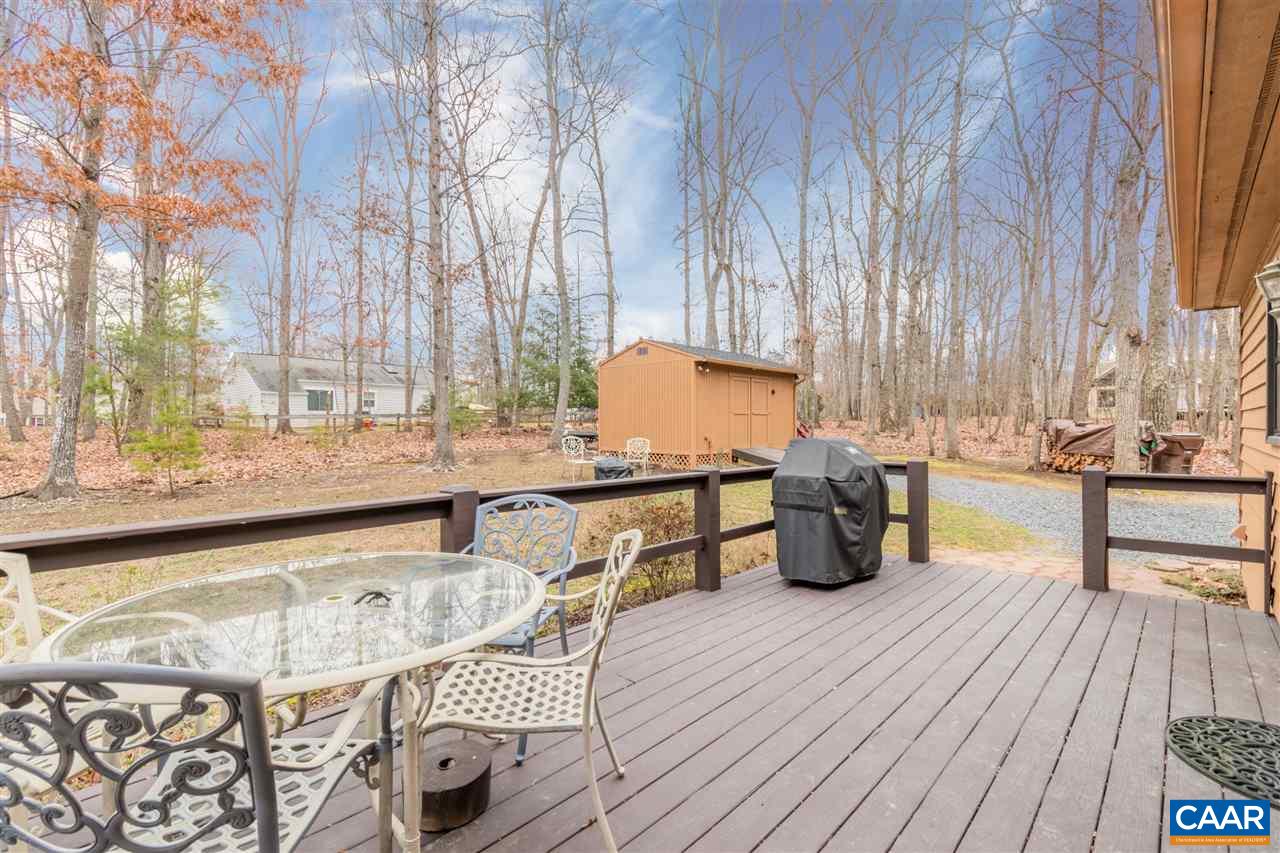 33 Oak Grove Road Palmyra, VA 22963 - Photo 5 of 42 a view of a chairs and table on the wooden floor