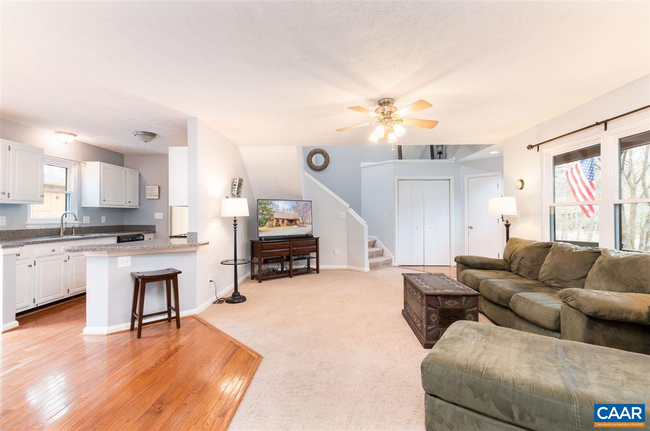 33 Oak Grove Road Palmyra, VA 22963 - Photo 8 of 42 a living room with furniture and kitchen view