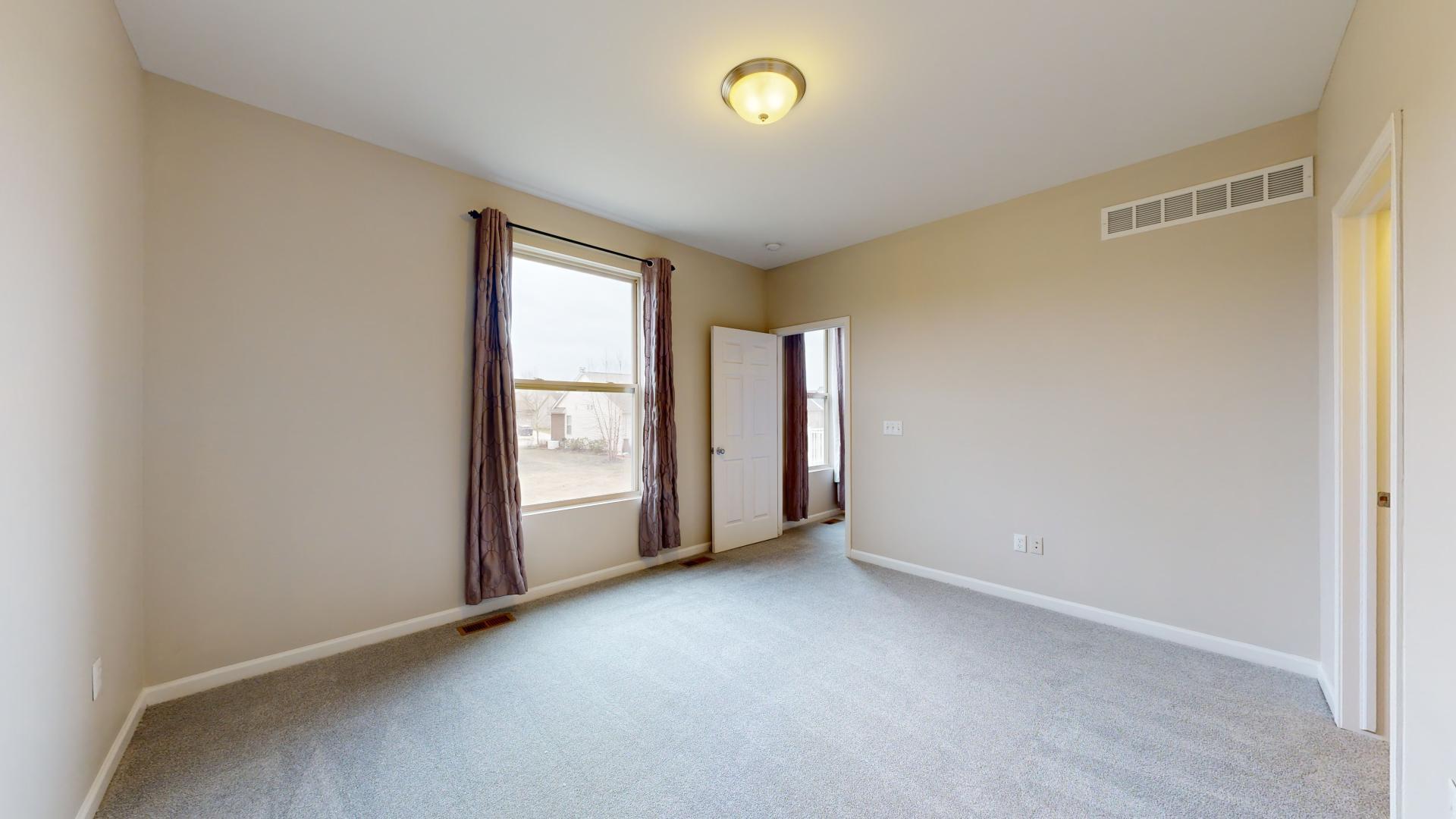 8328 Stamford Road Ypsilanti, MI 48198 - Photo 10 of 21 Primary Suite Bedroom