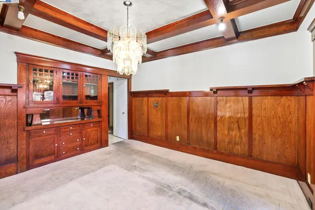 a room with closet and wooden walls