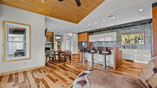 a bedroom with furniture and a potted plant