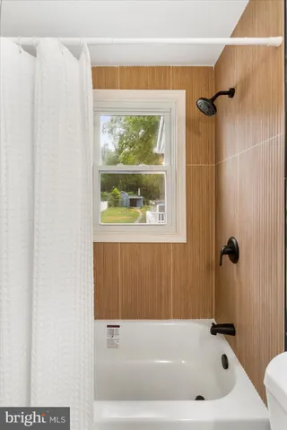 a bathroom with a bathtub