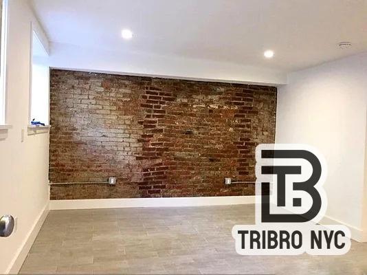 230 East 7th Street, Unit 1A Manhattan, NY 10009 - Photo 2 of 4 a view of a door with wooden floor