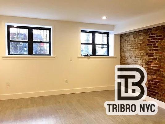 230 East 7th Street, Unit 1A Manhattan, NY 10009 - Photo 4 of 4 a front door view of a building