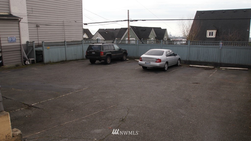 2222 Rucker Avenue Everett, WA 98201 - Photo 3 of 3 a car parked in front of a house