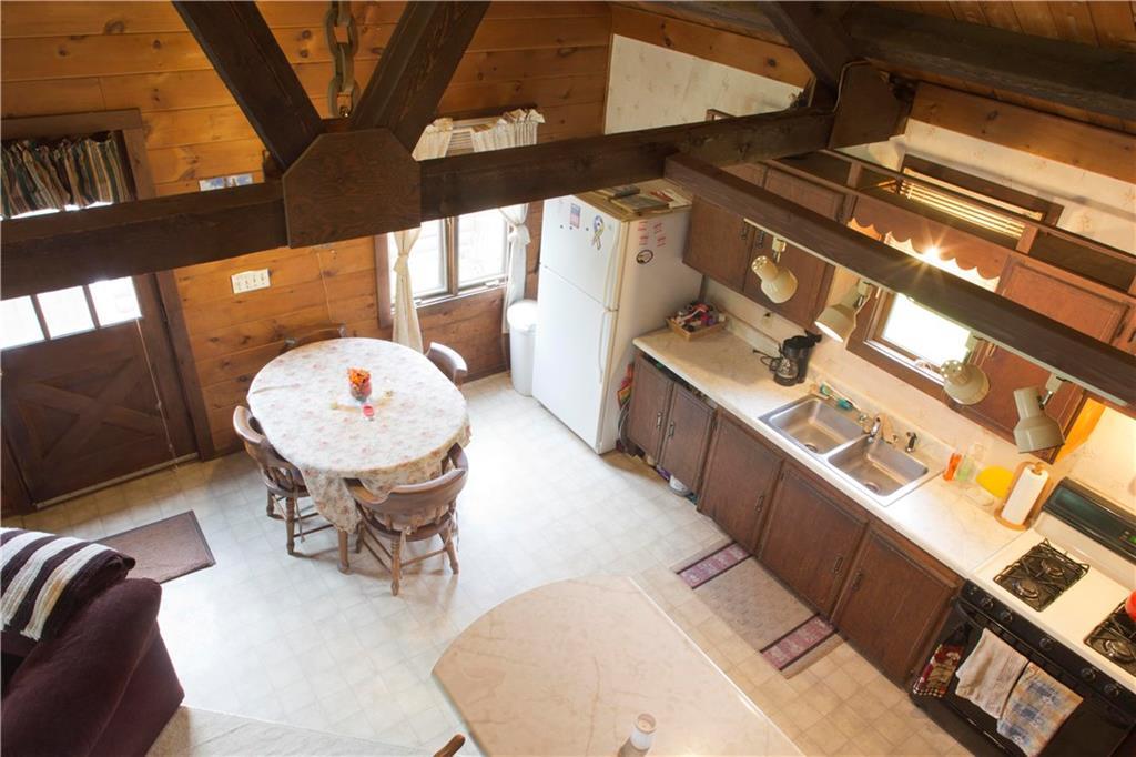 231 Lakeview Road Glenburn, ME 04401 - Photo 12 of 32 Kitchen view from loft