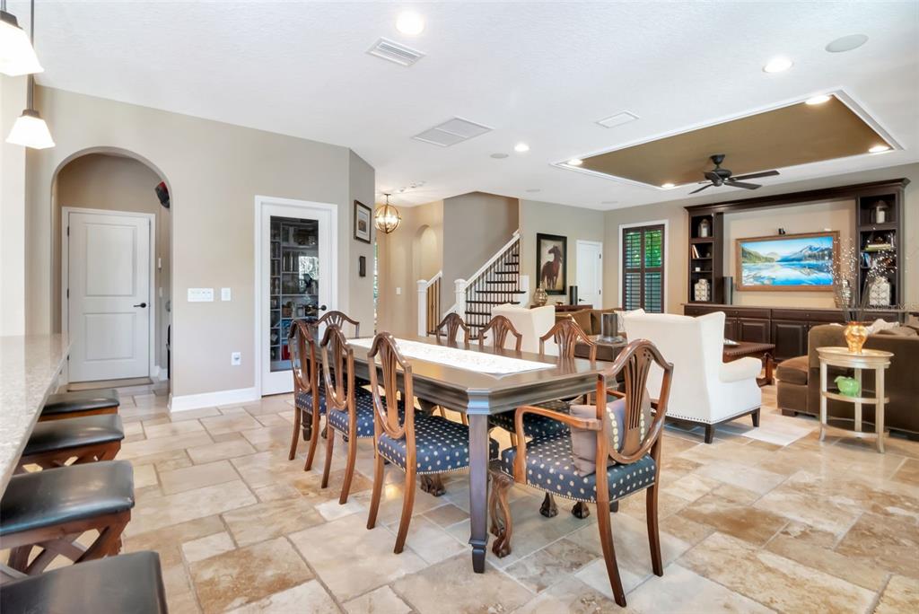 4527 Scarlet Loop Wesley Chapel, FL 33544 - Photo 24 of 57 a view of a dining room with furniture window and outside view