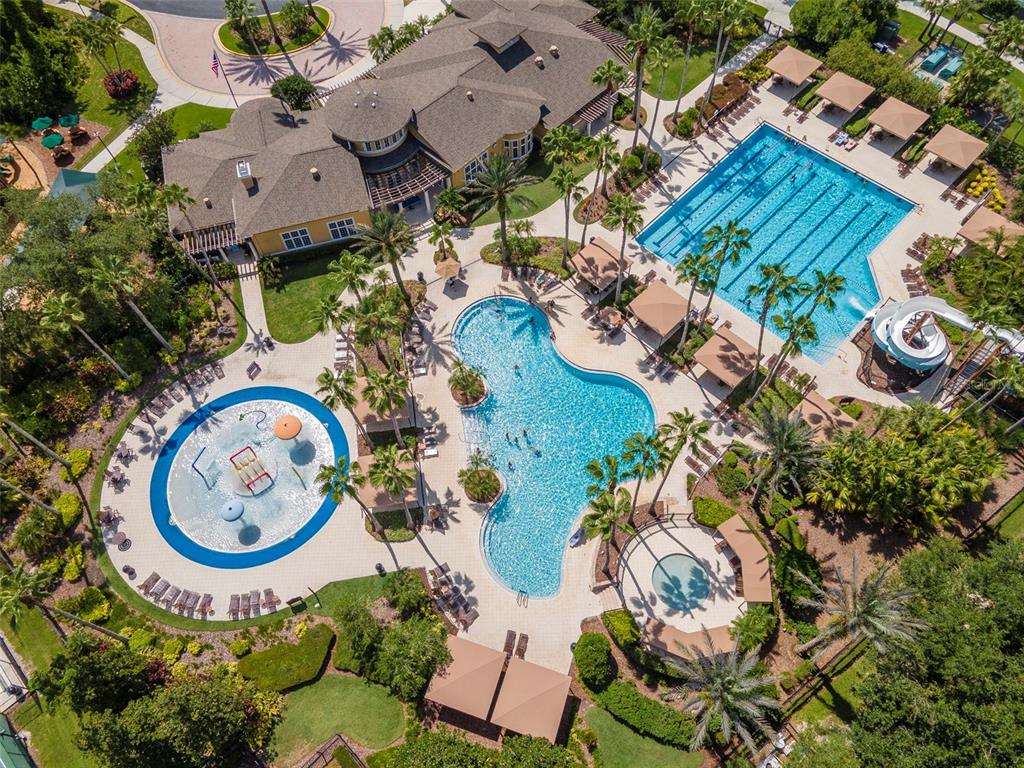 4527 Scarlet Loop Wesley Chapel, FL 33544 - Photo 46 of 57 an aerial view of a swimming pool and outdoor space