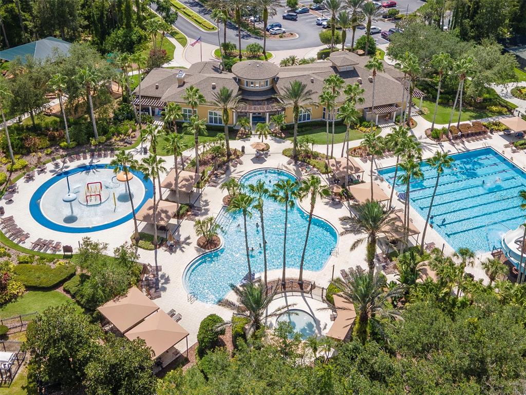 4527 Scarlet Loop Wesley Chapel, FL 33544 - Photo 52 of 57 an aerial view of a house with garden space and street view