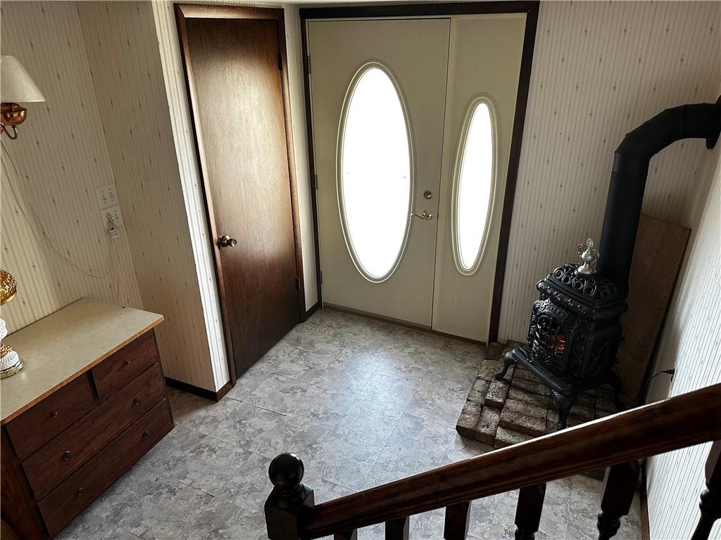 4076 Seneca Road Sharpsville, PA 16150 - Photo 6 of 15 a view of a livingroom with furniture and front door