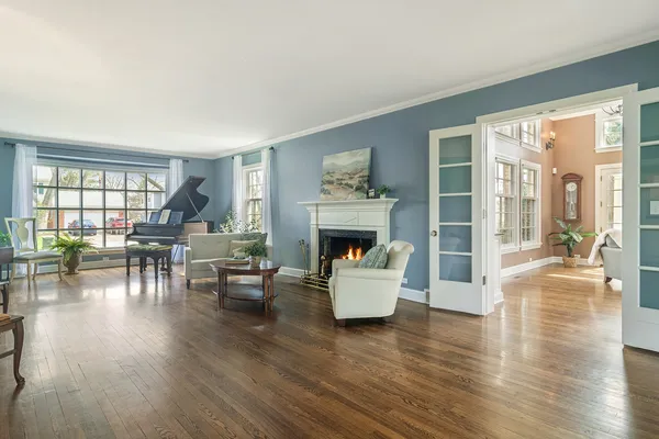 a living room with furniture and a fireplace